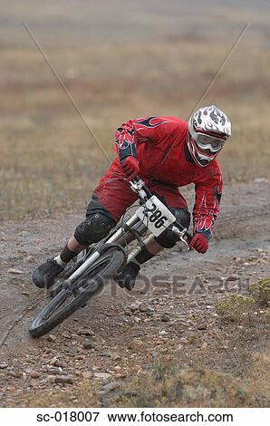 Mountain Biker Going Downhill View Large Photo Image Stock Photo - Mountain Biker Going Downhill. Fotosearch