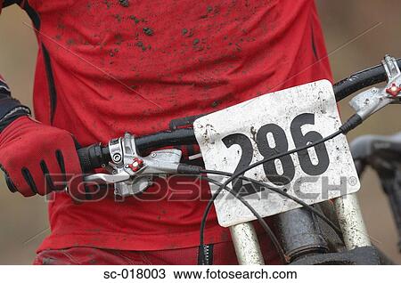 Mountain Biker With Their Hand on the Break View Large Photo Image Stock Image - Mountain Biker With Their Hand on the Break. Fotosearch