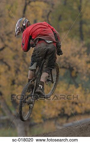 Stock Image - Mountain Biking. Fotosearch