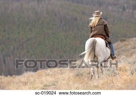 Cowgirl in the Countryside View Large Photo Image Picture - Cowgirl in the Countryside. Fotosearch