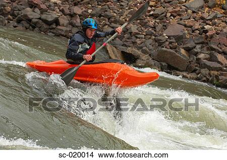 Kayaker Negotiating the River View Large Photo Image Picture - Kayaker Negotiating the River. Fotosearch