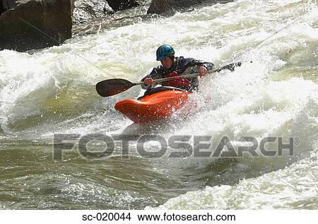 Kayaker Negotiating the River View Large Photo Image Picture - Kayaker Negotiating the River. Fotosearch