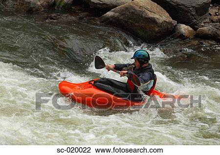 Kayaker Negotiating the River View Large Photo Image Stock Image - Kayaker Negotiating the River. Fotosearch