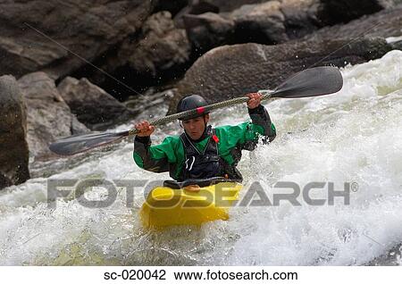 Kayaker Negotiating the River View Large Photo Image Stock Image - Kayaker Negotiating the River. Fotosearch