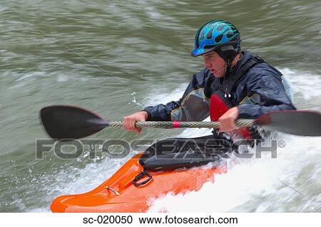 Kayaker Negotiating the River View Large Photo Image Stock Image - Kayaker Negotiating the River. Fotosearch