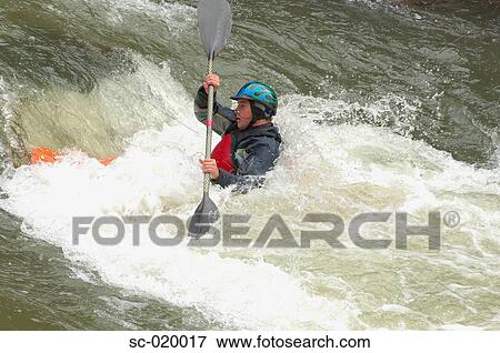 Kayaker Negotiating the River View Large Photo Image Stock Photo - Kayaker Negotiating the River. Fotosearch