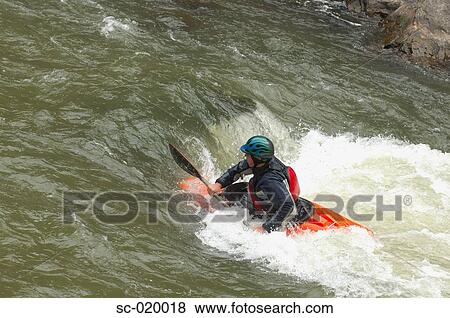 Kayaker Negotiating the River View Large Photo Image Stock Photo - Kayaker Negotiating the River. Fotosearch
