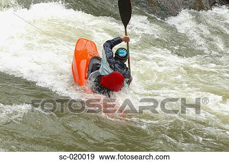 Kayaker Negotiating the River View Large Photo Image Stock Photo - Kayaker Negotiating the River. Fotosearch