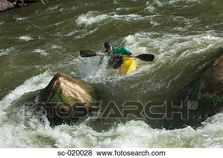 Kayaker Negotiating the River View Large Photo Image Stock Photo - Kayaker Negotiating the River. Fotosearch