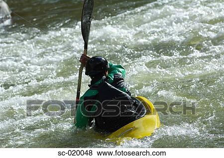 Kayaker Negotiating the River View Large Photo Image Stock Photo - Kayaker Negotiating the River. Fotosearch