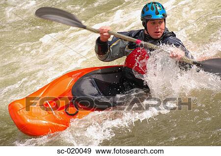 Kayaker Negotiating the River View Large Photo Image Stock Photo - Kayaker Negotiating the River. Fotosearch