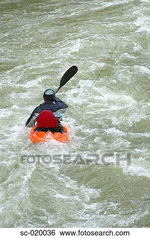 Kayaker Negotiating the River View Large Photo Image Stock Photograph - Kayaker Negotiating the River. Fotosearch