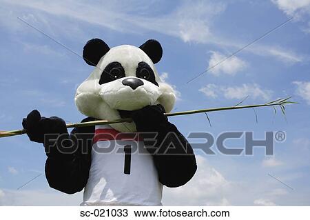 Stock Image - Panda Eating a Bamboo Shoot. Fotosearch