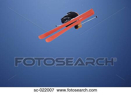Stock Photo - Skier Flying Through the Air. Fotosearch