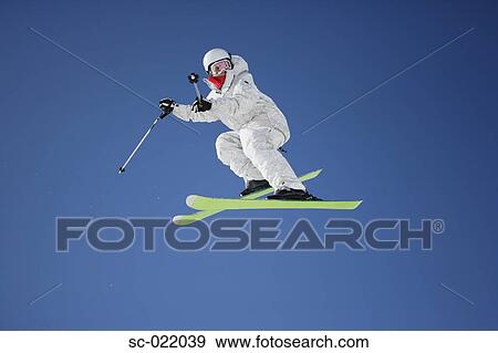 Skier Flying Through the Air View Large Photo Image Stock Photo - Skier Flying Through the Air. Fotosearch