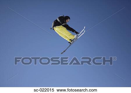 Stock Photography - Skier Flying Through the Air. Fotosearch