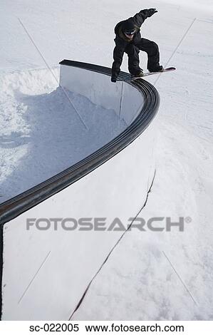 Snowboarder Doing a Railslide View Large Photo Image Stock Photography - Snowboarder Doing a Railslide. Fotosearch