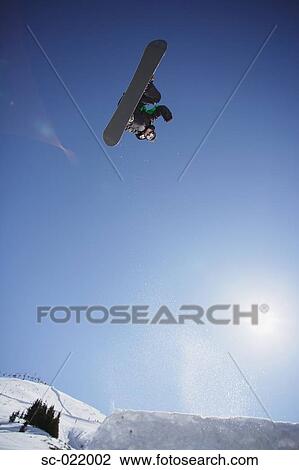 Snowboarder Flying Through the Air View Large Photo Image Stock Image - Snowboarder Flying Through the Air. Fotosearch
