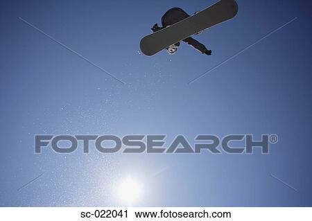 Snowboarder Flying Through the Air View Large Photo Image Stock Image - Snowboarder Flying Through the Air. Fotosearch