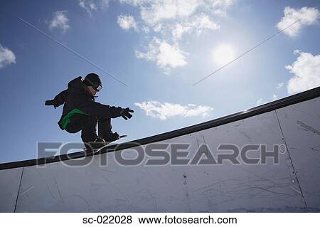 Snowboarder Railsliding View Large Photo Image Stock Photo - Snowboarder Railsliding. Fotosearch
