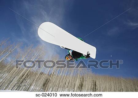 Stock Image - Snowboarder Getting Vert. Fotosearch