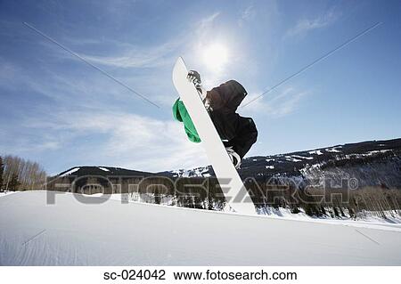Stock Image - Snowboarder Getting Vert. Fotosearch