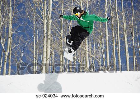 Snowboarder Riding a Half Pipe View Large Photo Image Picture - Snowboarder Riding a Half Pipe. Fotosearch