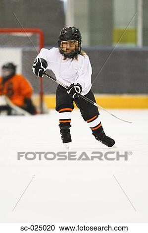Stock Image - Young Hockey Player. Fotosearch