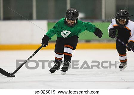 Stock Photo - Young Hockey Player. Fotosearch