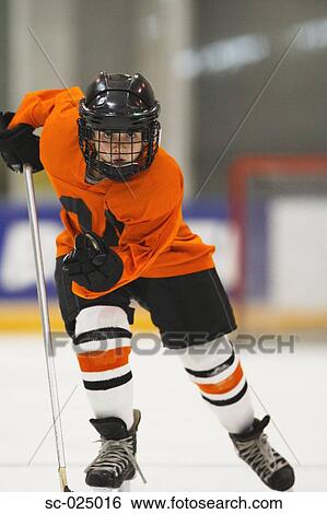 Stock Photograph - Young Hockey Player. Fotosearch