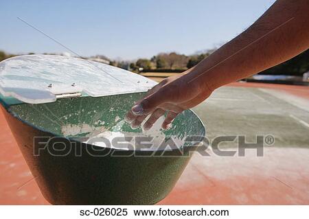 Athlete Reaching for Chalk in Bowl View Large Photo Image Stock Photography - Athlete Reaching for Chalk in Bowl. Fotosearch