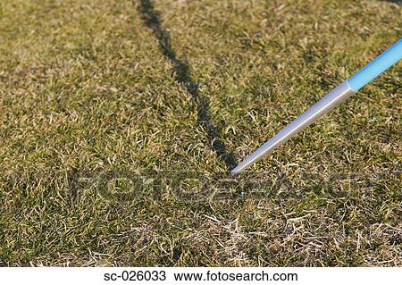 Javelin Thrown into the Ground View Large Photo Image Stock Image - Javelin Thrown into the Ground. Fotosearch