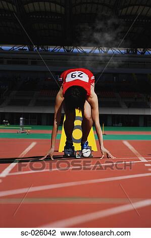 Stock Image - Runner at Starting Line. Fotosearch
