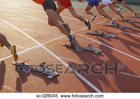 Stock Photography - Runners Starting Off. Fotosearch