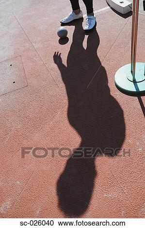 Stock Image - Shot Putter Getting Ready to Throw. Fotosearch