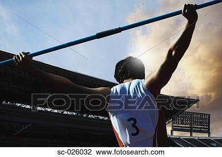 Stock Image - Thrower Preparing to Throw Javelin. Fotosearch