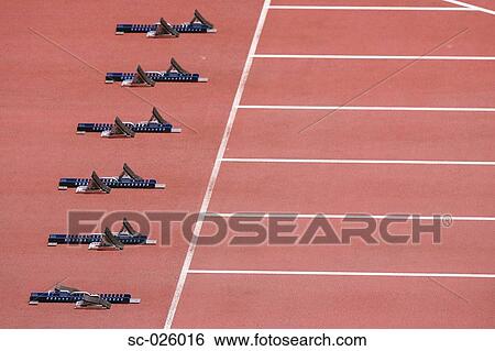 Track and field starting blocks at starting line View Large Photo Image Stock Photograph - Track and field starting blocks at starting line. Fotosearch
