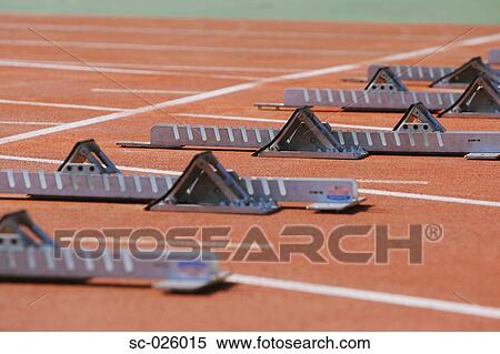 Track and field starting blocks at starting line View Large Photo Image Stock Photography - Track and field starting blocks at starting line. Fotosearch