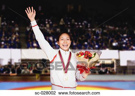 Stock Image - Winning Wrestler. Fotosearch