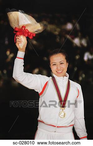 Stock Image - Winning Wrestler. Fotosearch