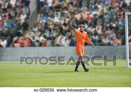 Stock Photography - Goalkeeper Pointing. Fotosearch