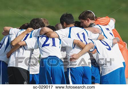 Soccer Team Huddling View Large Photo Image Stock Photo - Soccer Team Huddling. Fotosearch