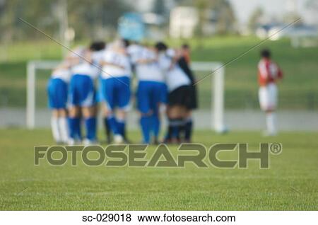 Soccer Team Huddling View Large Photo Image Stock Photo - Soccer Team Huddling. Fotosearch