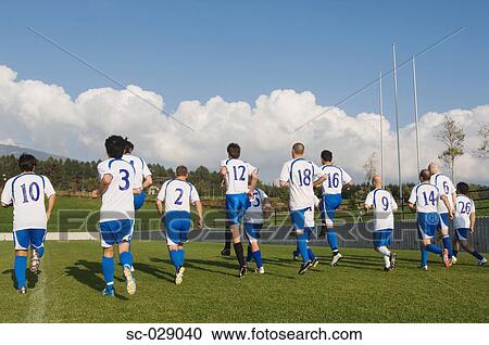 Stock Image - Soccer Team Warming Up. Fotosearch