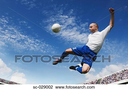 Stock Image - Soccer Volley. Fotosearch