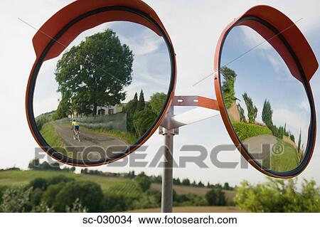 Reflection in road mirrors, close up View Large Photo Image Picture - Reflection in road mirrors, close up. Fotosearch
