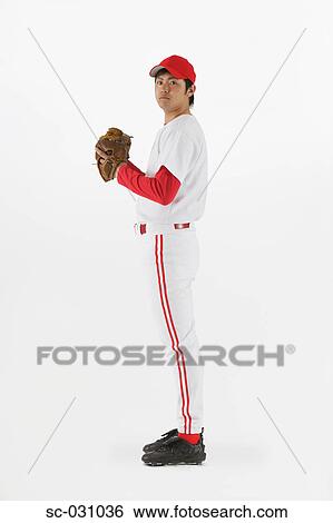 Stock Photograph - Pitcher Holding Baseball. Fotosearch