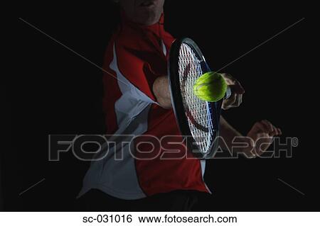 Tennis Player Swinging at Ball View Large Photo Image Stock Photograph - Tennis Player Swinging at Ball. Fotosearch