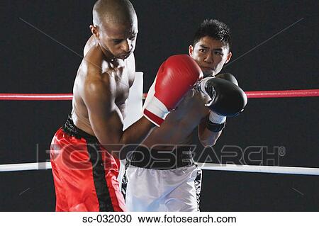 Japanese boxer hitting his opponent View Large Photo Image Stock Image - Japanese boxer hitting his opponent. Fotosearch