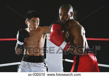 Japanese boxer punching to his opponent View Large Photo Image Stock Image - Japanese boxer punching to his opponent. Fotosearch